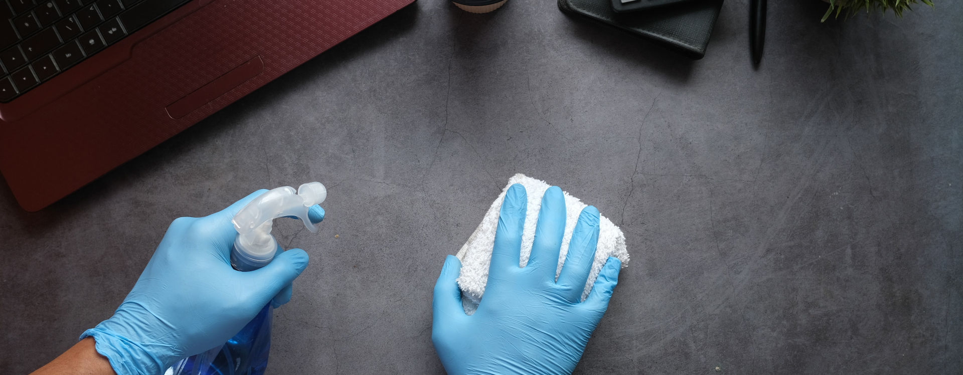 Sanitization worker cleaning furniture