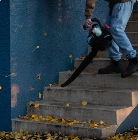 Worker cleaning staircase